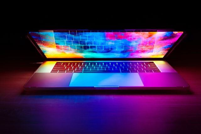 laptop with multicolor screen glowing