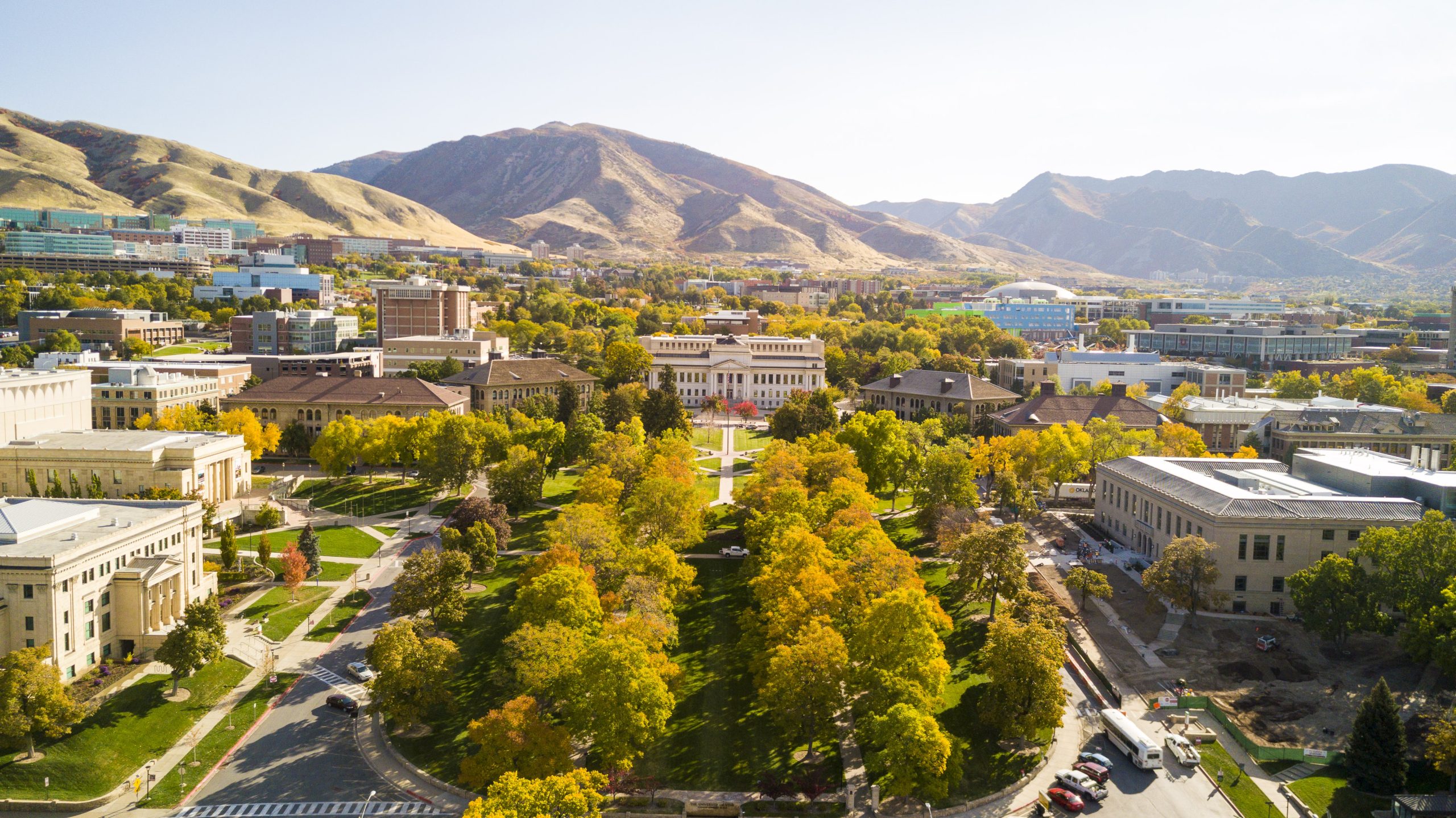 an aerial view of Presidents Circle with autumn foliage on the trees covering campus