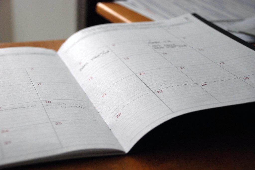 open white planner and calendar